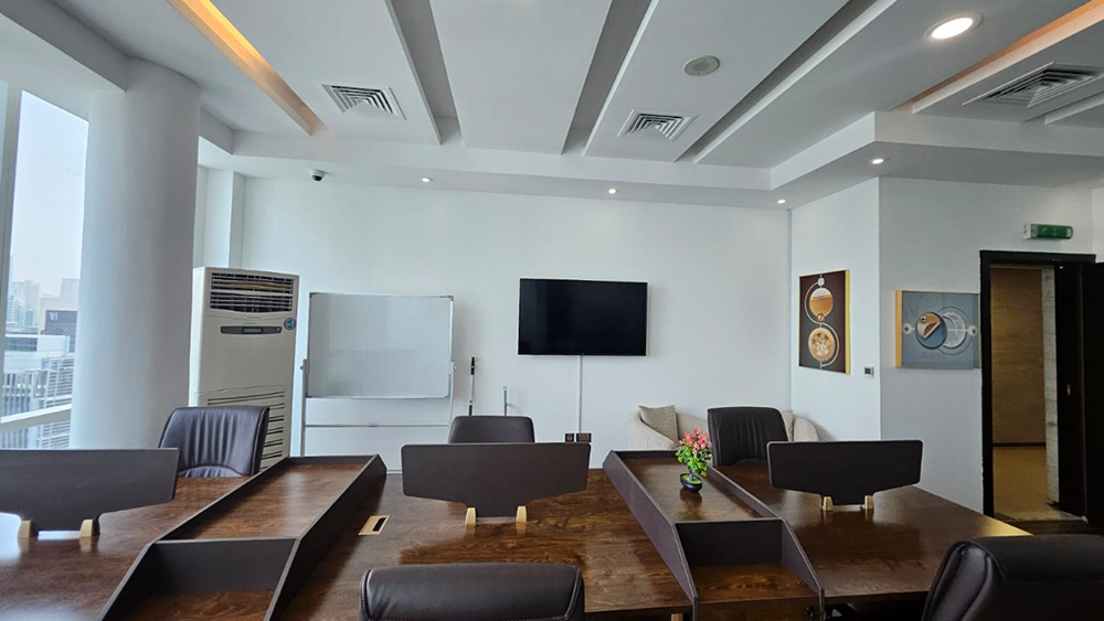 Vacant office space with glass partitions and Burj Khalifa views in Park Lane Tower, Business Bay