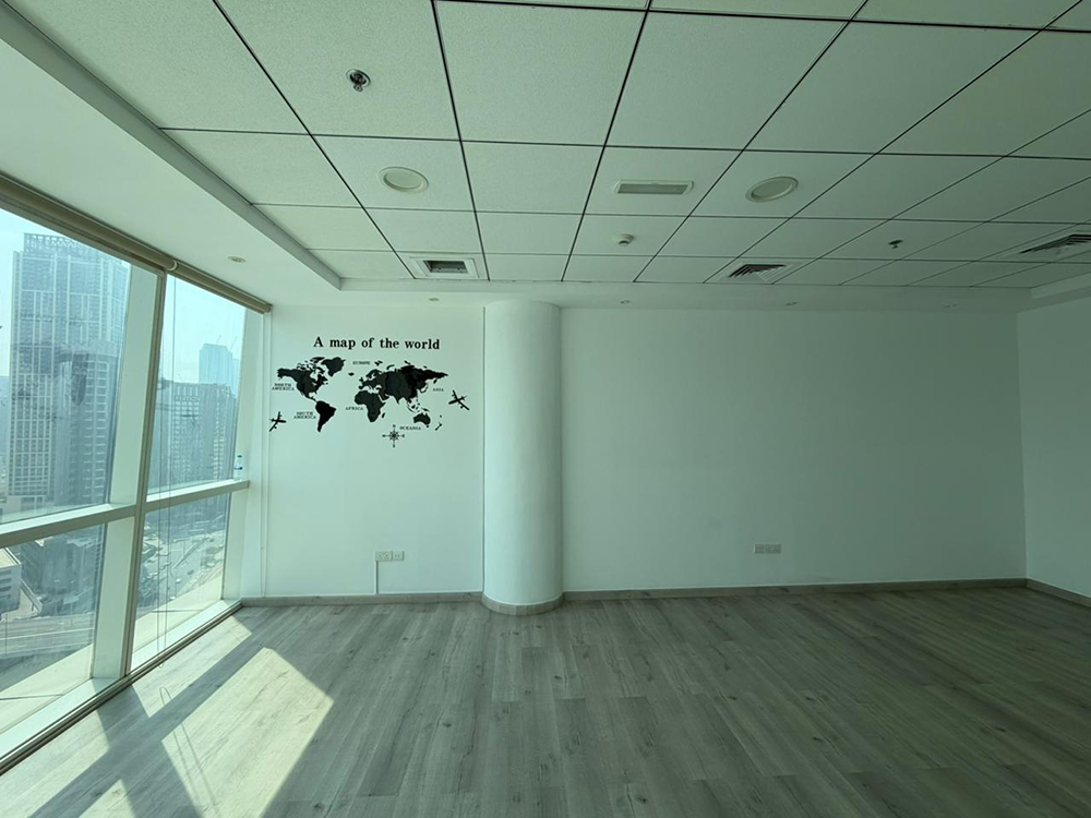 Fully fitted office space with glass partitions and canal views for rent in B2B Tower, Business Bay