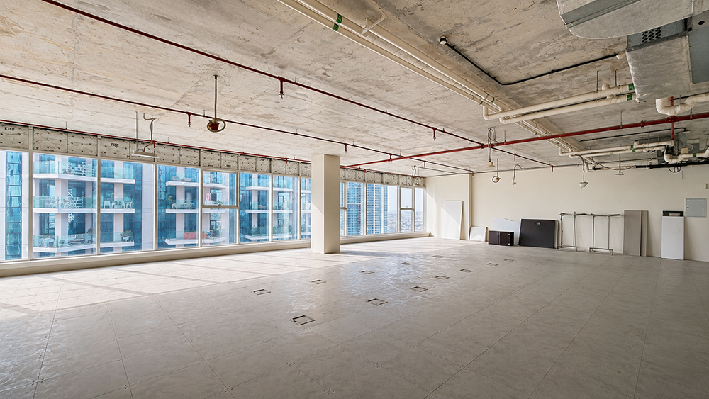 Open-layout shell and core office space for rent in Al Manara Tower, Business Bay