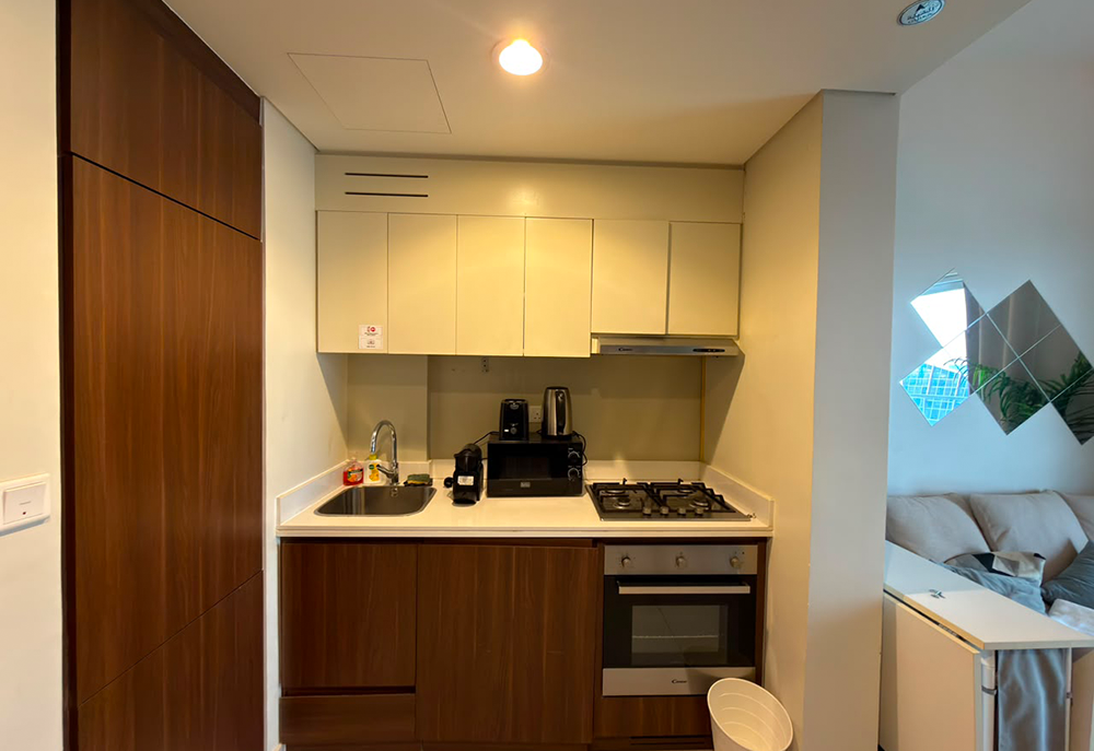 Furnished one-bedroom apartment interior in Business Bay